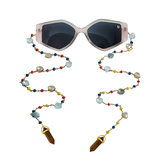 Blush-frame sunglasses with dark lenses and a colorful beaded chain featuring crystals and golden charms-front view