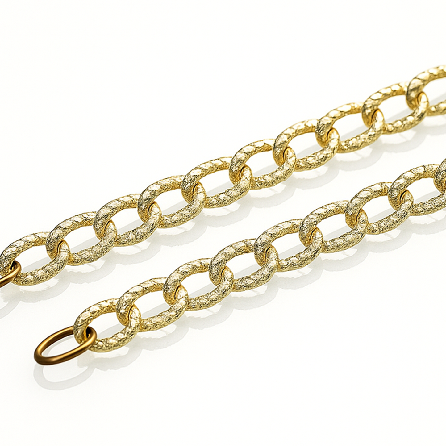 Gold chain with shimmering oval rings linked to each other-zoomed view