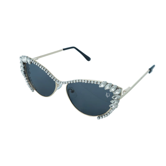Woman wearing cat-eye sunglasses with dark lenses and a rhinestone-embellished frame-sunglasses view