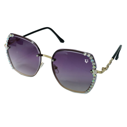 Sunglasses with gradient lenses and crystal finishing at its edges- angle view