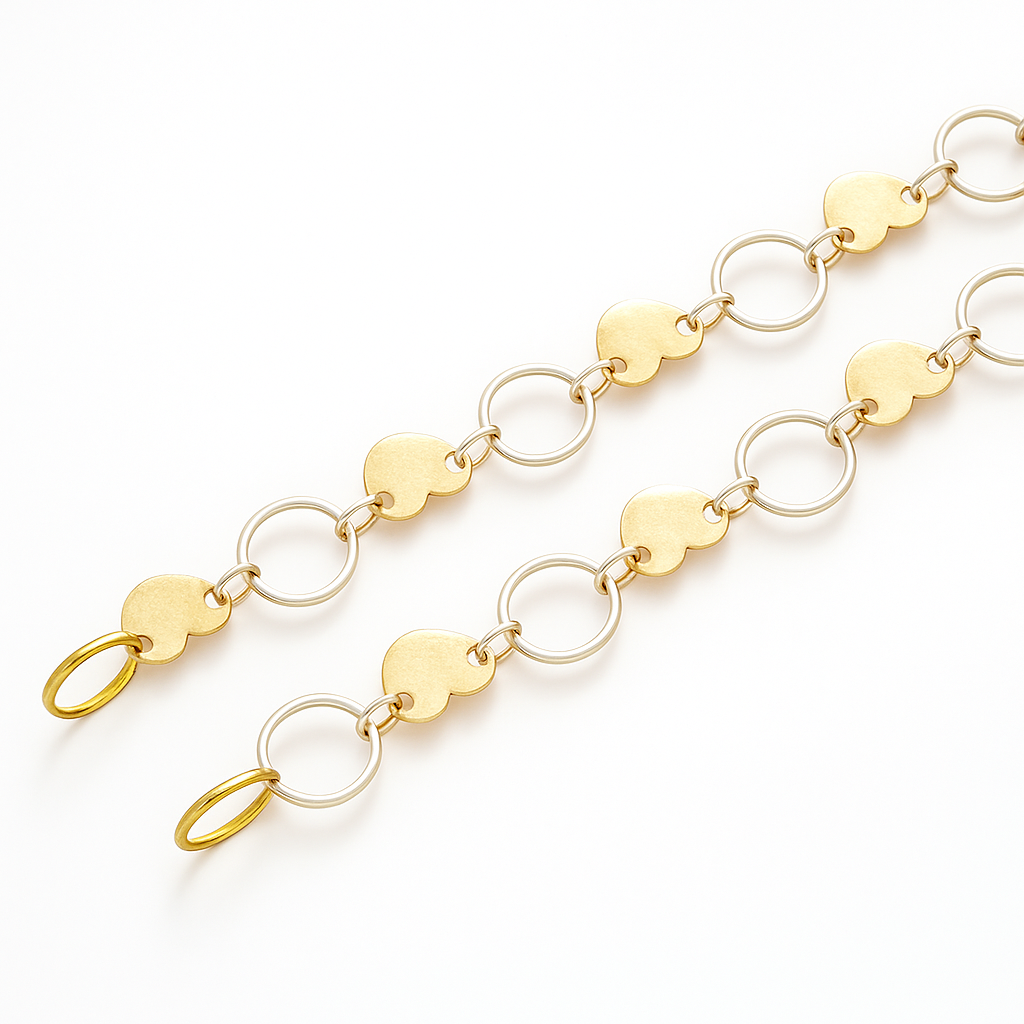 Gold dual linker chain with leaf shape disc linked to oval rings