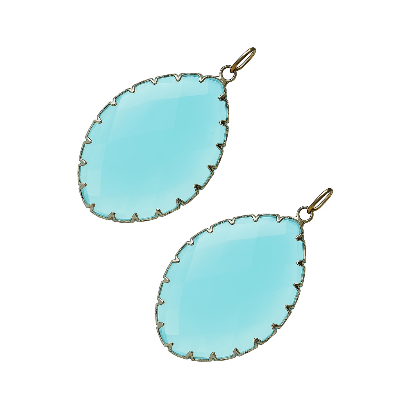 Teardrop-shaped aqua blue gemstone pendants with a gold prong setting-angle view