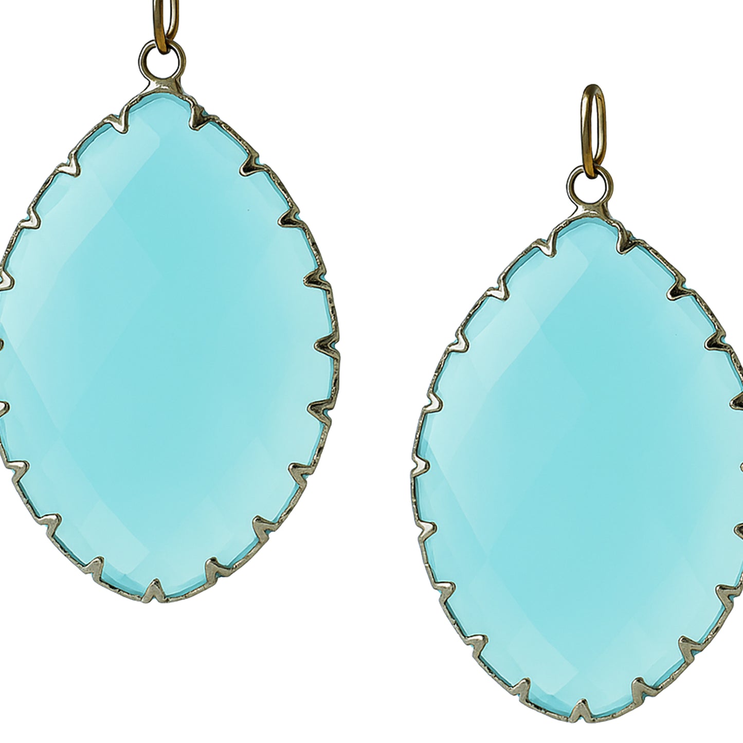Teardrop-shaped aqua blue gemstone pendants with a gold prong setting-zoomed view