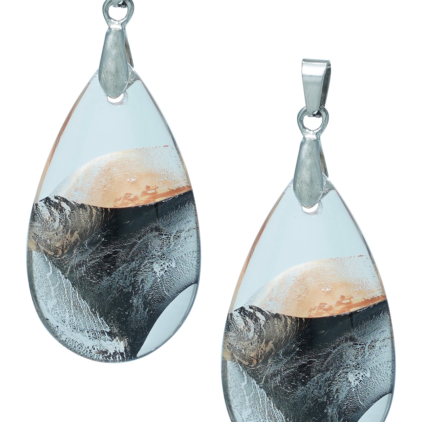 Teardrop-shaped glass pendants with a gold and black swirl design and silver hooks-zoomed view