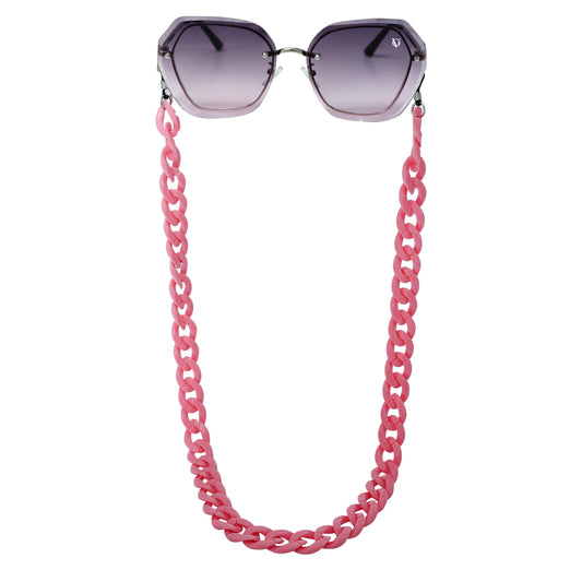 Sunglasses with purple gradient hexagonal frame lenses attached to a bold chunky pink chain-front view