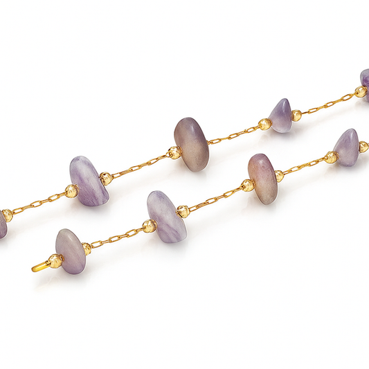 Gold chain with purple gemstone beads in a disc shape-zoomed view