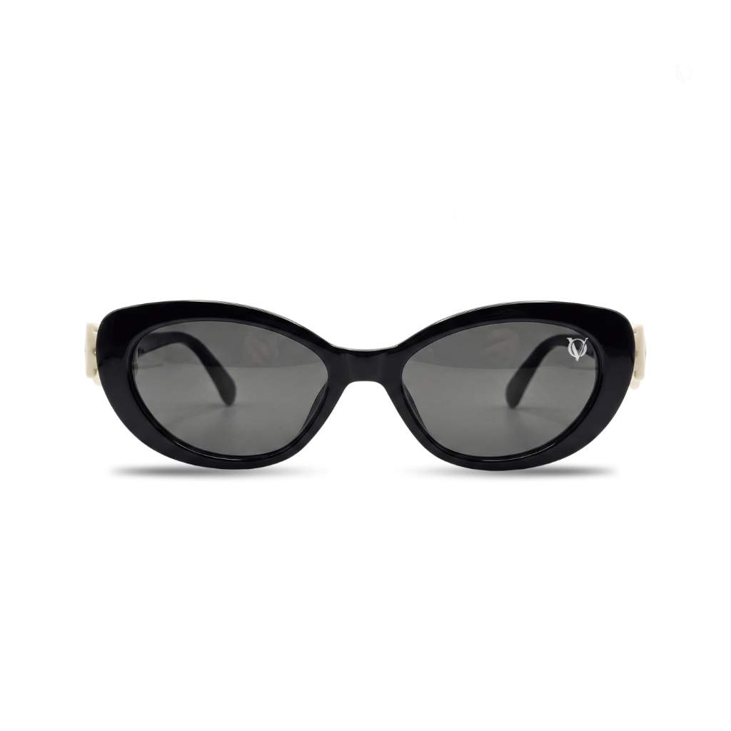 Black sunglasses with a white frame on a white background