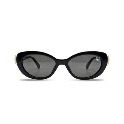 Black sunglasses with a white frame on a white background