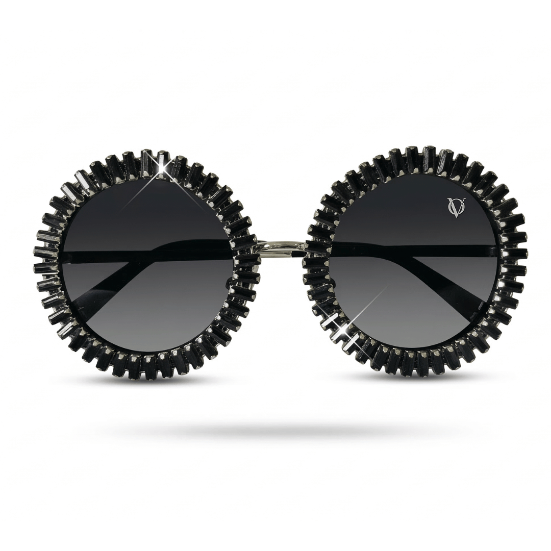 Sunglasses with black gear-like frame on a white background