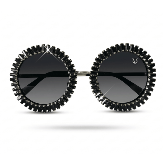 Sunglasses with black gear-like frame on a white background