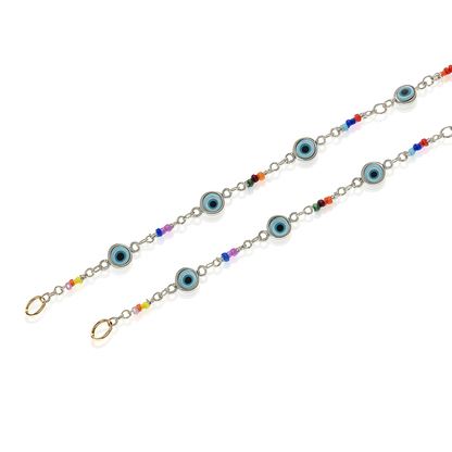 Silver chain with blue evil eye charms and colorful beads for stylish protection jewelry
