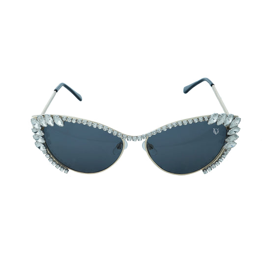 Woman wearing cat-eye sunglasses with dark lenses and a rhinestone-embellished frame-whole view