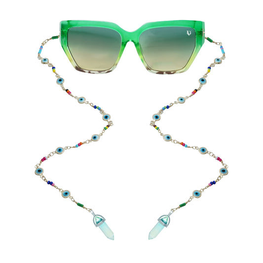 Green sunglasses with gradient lenses attached to a colorful beaded chain featuring evil eye accents and crystal pendants-front view