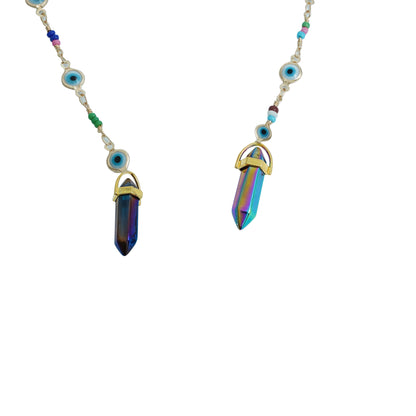 Blue-lensed sunglasses with a silver frame are attached to a beaded chain featuring blue and multicolored accents, ending in two crystal charms-charm view
