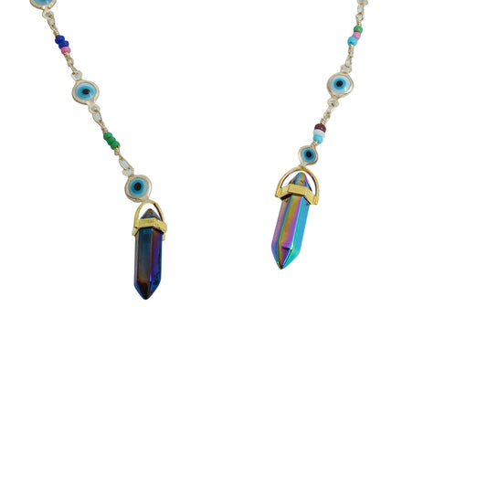 Blue-lensed sunglasses with a silver frame are attached to a beaded chain featuring blue and multicolored accents, ending in two crystal charms-charm view