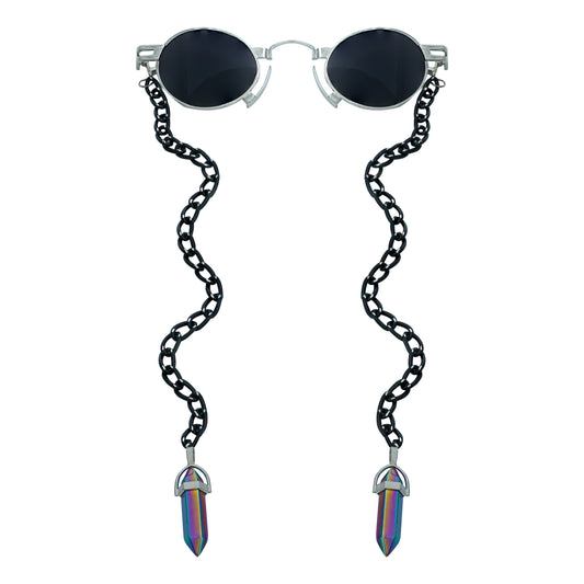 Round oval shaped sunglasses with a silver metallic frame attached to black chain, which holds a pendant shaped holographic vibrant crystal-front view