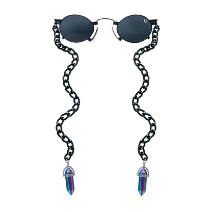 Round black sunglasses with a black metallic chain featuring rainbow-tinted crystal charms-front view