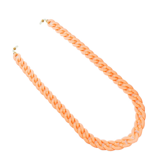 Chunky peach resin sunglasses chain with interlocking links & white rubber loops on each end.