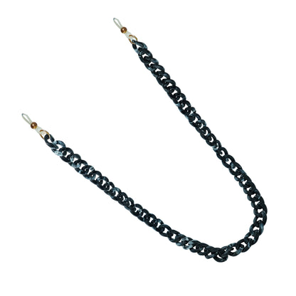 Chunky black acrylic sunglasses chain with interlocking links and white rubber loops on each end.