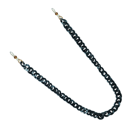 Chunky black acrylic sunglasses chain with interlocking links and white rubber loops on each end.
