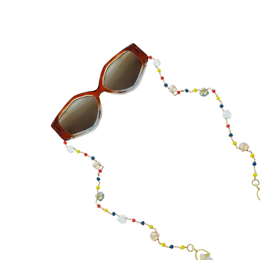 Bold oversized hexagonal frames with multicolored small beads balanced with light translucent crystal and white charms for women's fashion-tilt pose