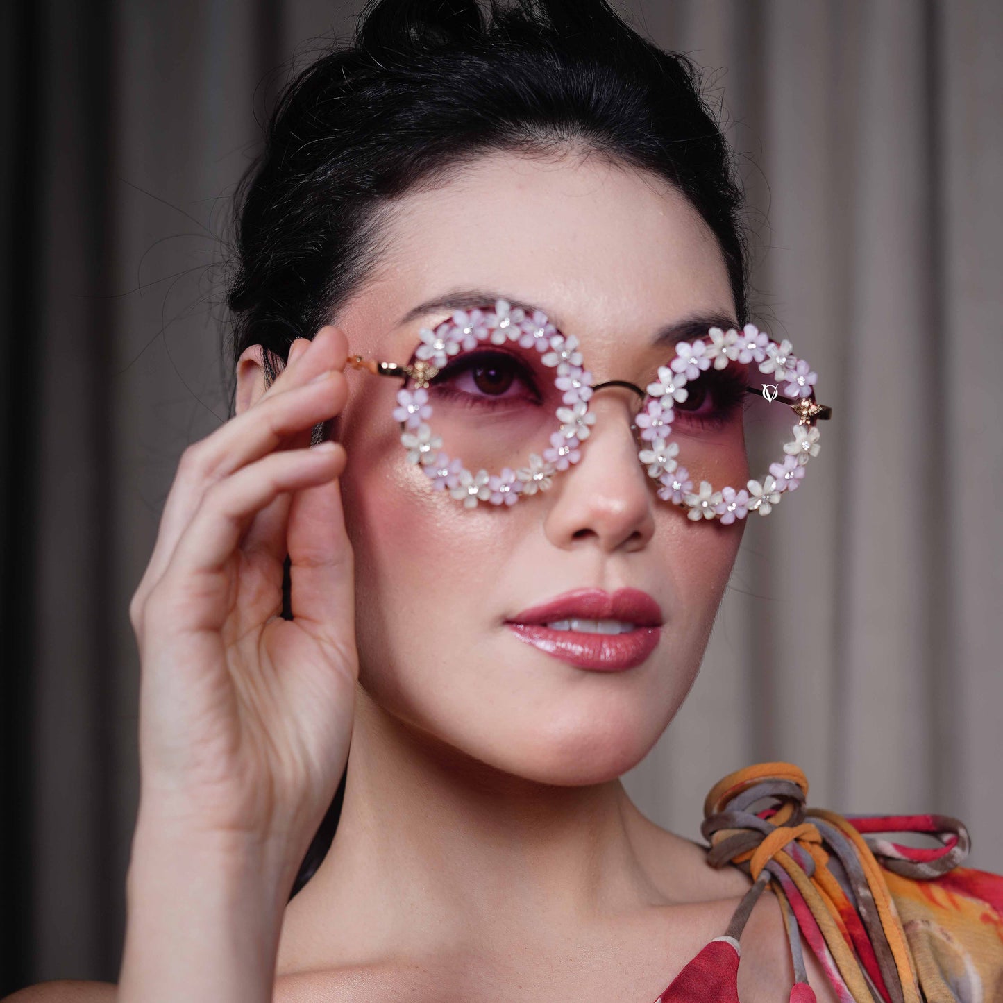 Oversized pink gradient lenses with floral crystal studded finishing-side angle view