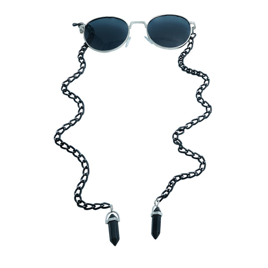 Dark-lensed sunglasses with a silver frame, paired with a black chain and black crystal pendants with silver cap-front view