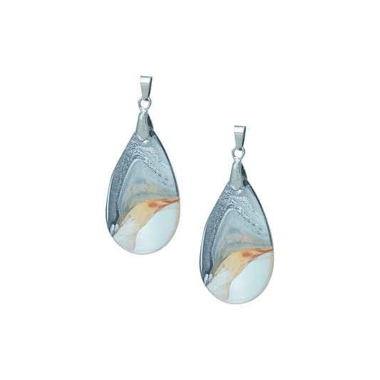 Teardrop-shaped glass pendants with a gold and crystal silver swirl design and silver hooks-front view
