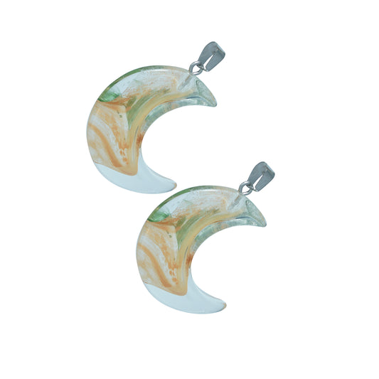 Crescent moon-shaped translucent glass charms with a green and gold swirl design and a silver loop-angle view