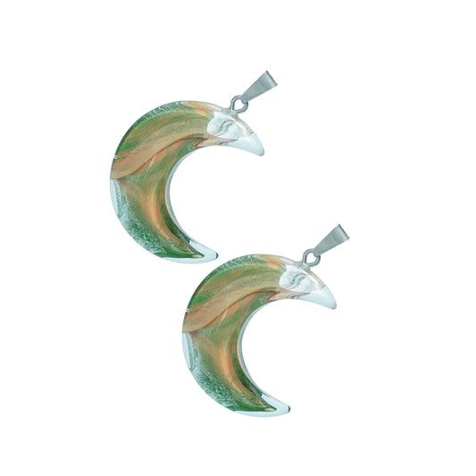 Crescent moon-shaped glass charms with green and golden swirl design and a silver loop-angle view

