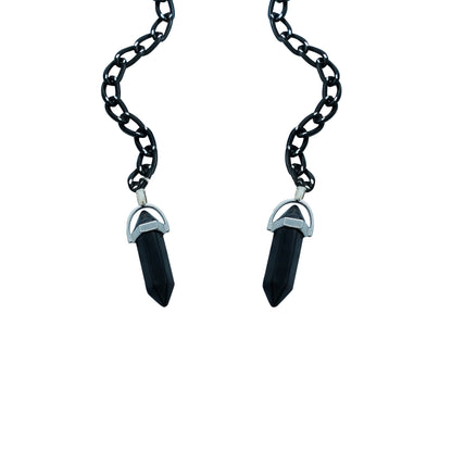 A pair of round, dark-lensed sunglasses with a silver frame is connected to a black chain, which holds a pendant shaped black crystal(Obsidian Stone)-charm view